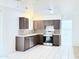 Traditional kitchen featuring stainless steel appliances and tiled countertops at 7202 N 36Th Ave, Phoenix, AZ 85051
