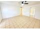 Bright living room featuring tiled floor and an exterior door at 7202 N 36Th Ave, Phoenix, AZ 85051