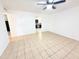 Bright living room featuring tiled floor and view of kitchen at 7202 N 36Th Ave, Phoenix, AZ 85051