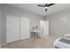 Bright bedroom with double closets, a desk, and a comfortable bed perfect for relaxation at 7607 W Keim Dr, Glendale, AZ 85303