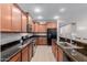 Well-equipped kitchen with sleek stainless steel appliances and granite countertops at 7607 W Keim Dr, Glendale, AZ 85303
