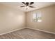This bedroom features wood look floors and a window for lots of natural light at 7769 W Bonitos Dr, Phoenix, AZ 85035