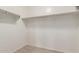 This walk in closet features shelving and rod for hanging clothes at 7769 W Bonitos Dr, Phoenix, AZ 85035