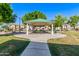 Park picnic area surrounded by manicured lawns and residential buildings at 7769 W Bonitos Dr, Phoenix, AZ 85035