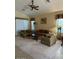 Spacious living room with vaulted ceiling, neutral color palette, and comfortable seating at 840 W Crooked Stick Dr, Casa Grande, AZ 85122
