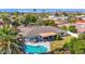 Aerial view of a beautiful home with a pool, lush landscaping, and a covered patio, perfect for outdoor living at 8582 E Via De Dorado --, Scottsdale, AZ 85258