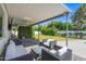 Inviting covered patio with comfortable seating, a ceiling fan, and views of the lush backyard and mature trees at 8582 E Via De Dorado --, Scottsdale, AZ 85258