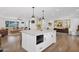 Open kitchen featuring an island with seating, stainless steel appliances, and a seamless flow to the living areas at 8582 E Via De Dorado --, Scottsdale, AZ 85258