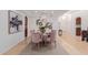 Elegant dining room featuring a round table, plush seating, and stylish light fixture, perfect for entertaining at 9208 N 83Rd St, Scottsdale, AZ 85258
