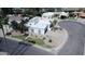 Home with manicured desert landscaping, mature palm trees, and a well-maintained lawn at 9208 N 83Rd St, Scottsdale, AZ 85258