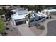 Beautiful home with a white fence, desert landscaping, and a view of palm trees and mountains at 9208 N 83Rd St, Scottsdale, AZ 85258