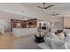 Open-concept living space with seamless flow to the kitchen, offering ample seating and natural light at 9208 N 83Rd St, Scottsdale, AZ 85258