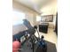 Bright exercise room with fitness equipment and hot tub with a view at 9807 W Mcrae Way, Peoria, AZ 85382