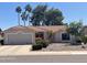 Charming home with tile roof and well-manicured desert landscaping at 9807 W Mcrae Way, Peoria, AZ 85382