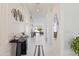 Bright and airy entrance featuring sleek decor, tile flooring, and an inviting view into the living space at 10034 E Thunderbolt Ave, Mesa, AZ 85212