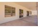 Covered back patio with sliding glass doors and outdoor living space at 1018 E Knoll St, Mesa, AZ 85203