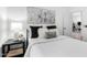 Comfortable bedroom features modern decor, a plush bed, and soft, decorative pillows at 1018 E Knoll St, Mesa, AZ 85203