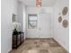 Inviting foyer with tiled floors, natural lighting, and stylish decor at 1018 E Knoll St, Mesa, AZ 85203