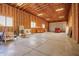 Open and spacious garage featuring a red sports car with ample storage space at 1018 E Knoll St, Mesa, AZ 85203