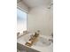 Bright bathroom features a soaking tub with bath caddy, perfect for relaxing at 1095 W Sandy Banks --, Gilbert, AZ 85233