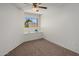 Cozy bedroom with neutral carpet and natural light from the window ledge at 1095 W Sandy Banks --, Gilbert, AZ 85233