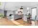 Open-concept living and dining area with modern decor and comfortable seating arrangements at 110 W Missouri Ave # 18, Phoenix, AZ 85013
