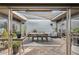 Charming outdoor patio with brick flooring, modern furniture, and ample sunlight at 110 W Missouri Ave # 18, Phoenix, AZ 85013