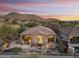 Aerial view of the property featuring a backyard oasis with a pool and mountain views at 11462 E Kora Way, Scottsdale, AZ 85255