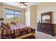This main bedroom features a private balcony with mountain views and a beautiful ensuite at 11462 E Kora Way, Scottsdale, AZ 85255