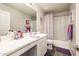 Bathroom with ample counter space, a shower-tub combo, and a large vanity at 1151 S Avoca --, Mesa, AZ 85208