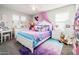 Colorful bedroom features a plush bed and plenty of natural light at 1151 S Avoca --, Mesa, AZ 85208