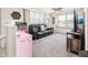 Cozy bonus room features a leather sofa, ceiling fan, and bright natural light at 1151 S Avoca --, Mesa, AZ 85208