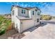 Two-story home showcasing a garage and tidy landscaping in a peaceful neighborhood setting at 1151 S Avoca --, Mesa, AZ 85208