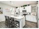 Bright kitchen features a large island with seating, stainless steel appliances, and decorative accents at 1151 S Avoca --, Mesa, AZ 85208