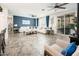 Open-concept living area with tile floors, bright lighting, and contemporary decor creating a welcoming space at 1151 S Avoca --, Mesa, AZ 85208
