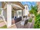 Inviting covered patio with comfortable seating and ceiling fan, perfect for outdoor relaxation at 1151 S Avoca --, Mesa, AZ 85208