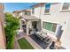 High angle view of a spacious patio with a covered seating area and an outdoor dining space at 1151 S Avoca --, Mesa, AZ 85208