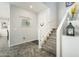 Close up of a staircase with neutral carpet and white railings enhancing the modern interior design at 1151 S Avoca --, Mesa, AZ 85208