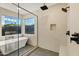 Spa-like bathroom with a freestanding tub, glass-enclosed shower, and mountain views at 14049 S 8Th St, Phoenix, AZ 85048