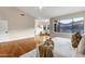 Bright bedroom with a large window offering scenic views and cozy seating area at 14049 S 8Th St, Phoenix, AZ 85048