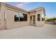 Exterior terrace with architectural details, tile roof, and a stucco finish at 14049 S 8Th St, Phoenix, AZ 85048