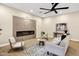 Cozy living room with a fireplace, contemporary furniture, and neutral decor at 14049 S 8Th St, Phoenix, AZ 85048