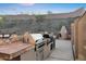 Outdoor kitchen featuring built-in grill, pizza oven, and counter space at 14049 S 8Th St, Phoenix, AZ 85048