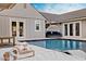 Inviting backyard pool with a sunbed, cabana, and meticulously kept architectural details at 16409 N 65Th Pl, Scottsdale, AZ 85254