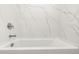 Clean bathtub featuring modern faucet at 17837 W Mission Ln, Waddell, AZ 85355