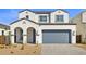 Beautiful two-story home boasting a well-kept front yard and a spacious two-car garage at 17837 W Mission Ln, Waddell, AZ 85355
