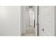 Hallway view featuring tile flooring and bright light at 17837 W Mission Ln, Waddell, AZ 85355