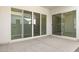 A large patio with sliding glass doors providing seamless indoor/outdoor living at 17837 W Mission Ln, Waddell, AZ 85355