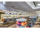 Community bowling alley with multiple lanes, seating, and ball racks, perfect for recreational fun at 18522 N Mica Dr, Sun City West, AZ 85375