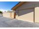 Well-maintained garage exterior with a closed door and a clean driveway, offering secure parking at 18522 N Mica Dr, Sun City West, AZ 85375